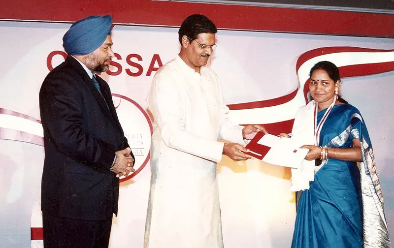 14th Godfrey Phillips Bravery Award being presented to Mrs. Minati Bindhani, 2006.